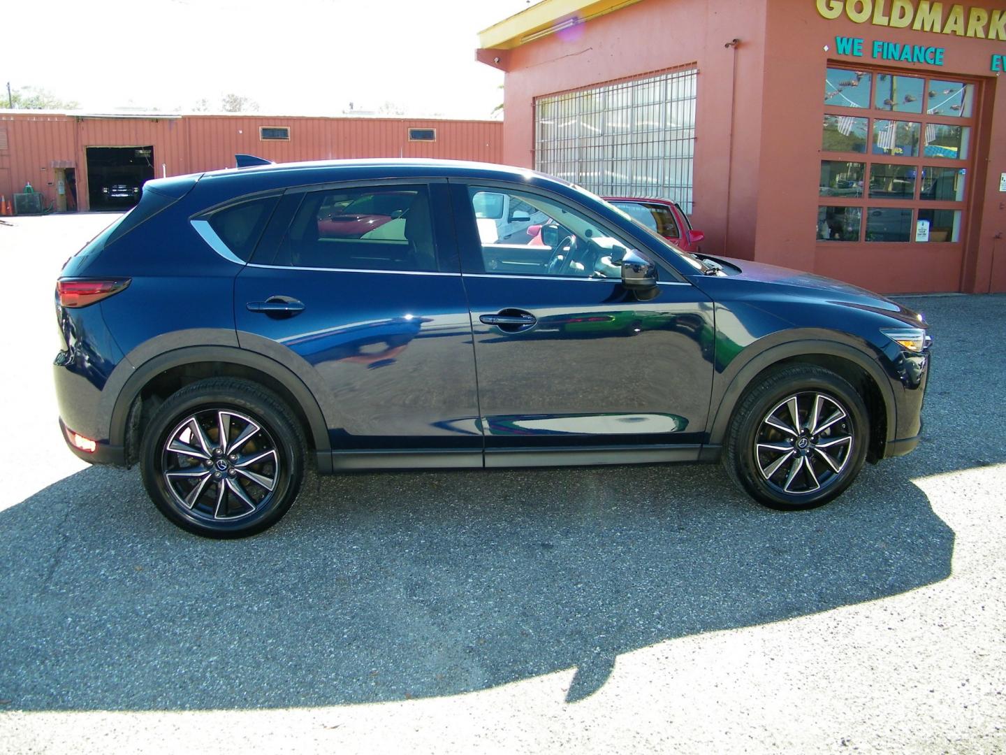 2018 Blue /Black Mazda CX-5 Grand Touring (JM3KFADM8J1) with an 2.5L L4 DOHC 16V engine, 6A transmission, located at 4000 Bee Ridge Road, Sarasota, FL, 34233, (941) 926-0300, 27.298664, -82.489151 - Photo#6